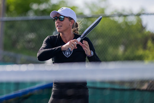 Megan Fudge wearing RIA's new Nova pickleball sunglasses