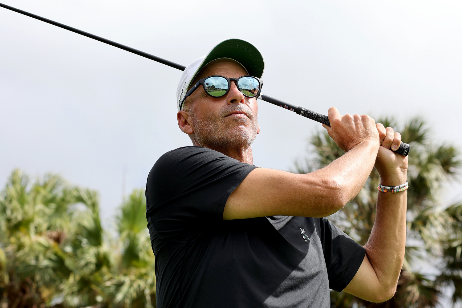 Rocco Mediate hitting a drive in RIA Eyewear Contour golf sunglasses