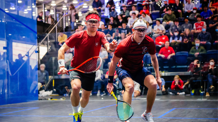 Two Men Play Competitive Squash